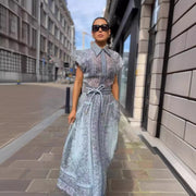 Autumn and Winter New Catwalk Print Positioning Two-Piece High-End Shirt Top Drawstring Long Skirt